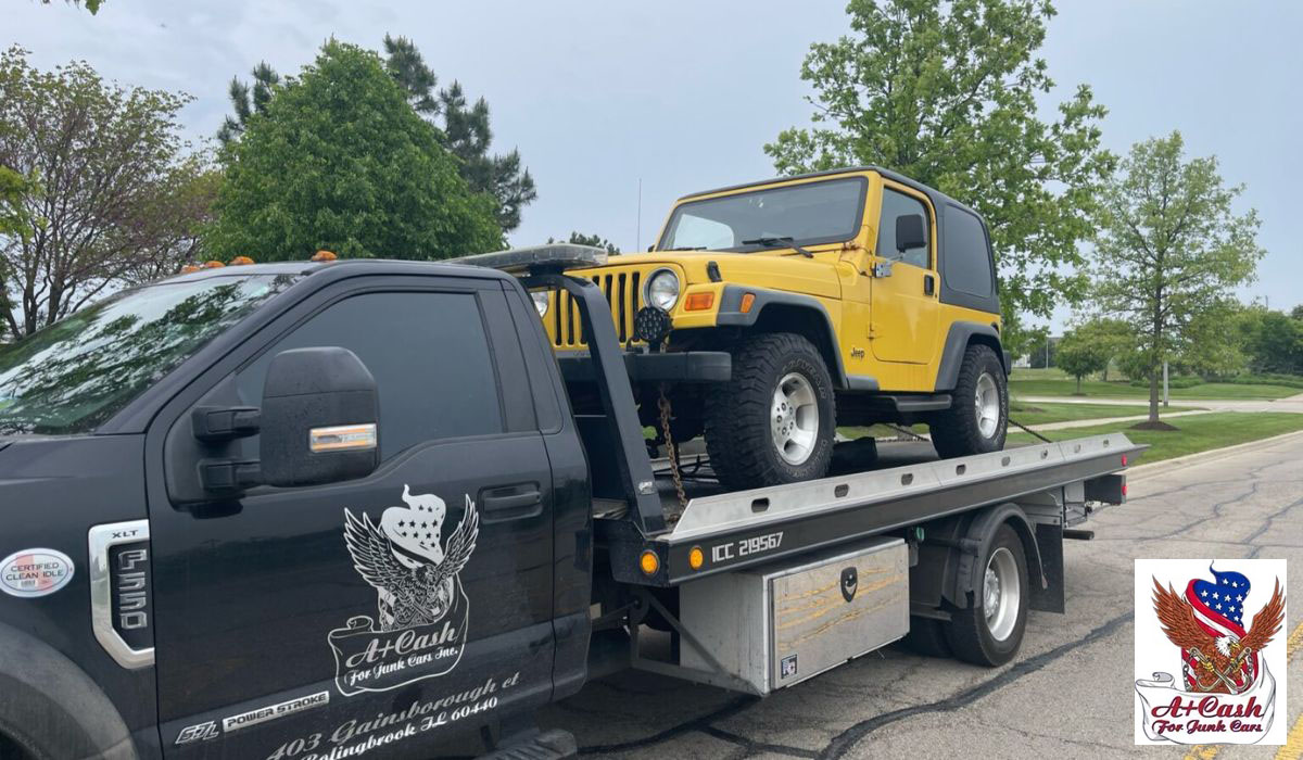 Jeep wrangler being towed by a tow truck.