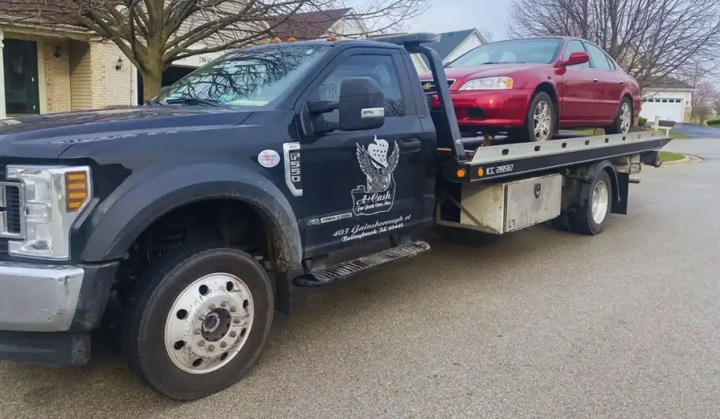 Sell your junk car with free towing—A+ Cash for Junk Cars Inc. hauls a junk vehicle in Homer Glen, IL, providing same-day pickup and instant cash payment.