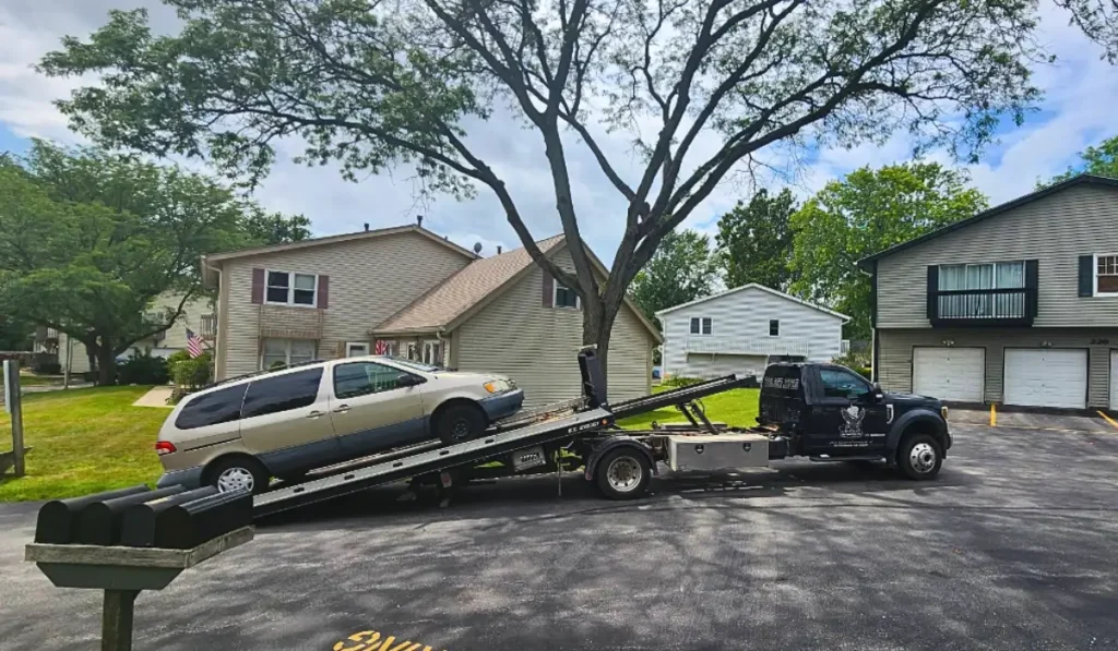 Get rid of old car fast with local junk car pickup in Bolingbrook IL at a residential driveway.
