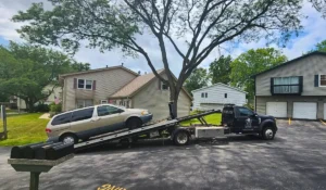 Get rid of old car fast with local junk car pickup in Bolingbrook IL at a residential driveway.